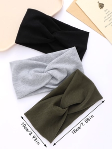 Three ribbed knit headbands in black, grey, and green with dimensions of 10x18cm