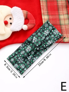 Detailed size chart showing green Christmas snowflake headband at 22cm by 8.5cm length