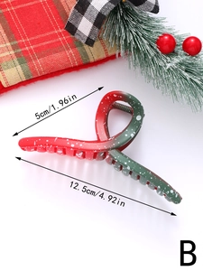 Detailed size view of a Christmas butterfly hair claw clip with snowflake patterns