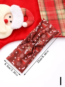 Close-up of red Christmas yoga headband with reindeer, snowflake prints and 8.5cm width info