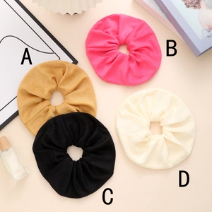 Oversized absorbent microfiber scrunchies in four soft colors for hair styling