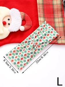 Detailed view of Christmas headband with red green ornaments and 22cm size marking