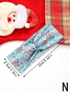 Detail view of sky blue Christmas printed yoga headband with Santa Claus and HO HO HO pattern