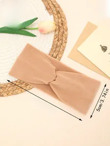 Detail view of the camel fleece twisted headband with size dimensions of 22cm by 9.5cm