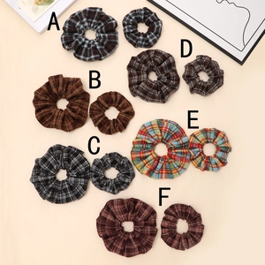 French retro plaid scrunchies set in various colors on beige background
