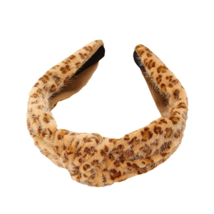 Plush leopard print knotted headband with soft faux fur texture for a trendy autumn look