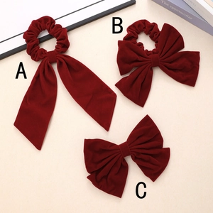 Three-piece set of wine red velvet bow hair ties and clips in a vintage elegant style