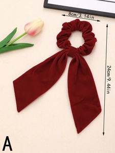Deep burgundy velvet bow hair scrunchie with long ribbons and 24cm total length