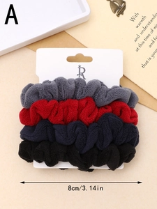 Detailed view of four colorful plush hair scrunchies with 8cm size dimension and soft texture