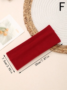 Detail view of burgundy fleece headband with dimensions 7.87in length and 2.95in width