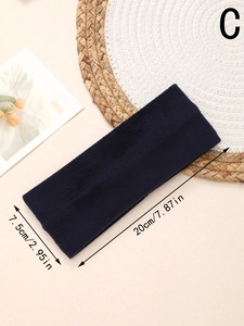 Detail view of navy blue fleece headband with dimensions 20cm by 7.5cm for winter warmth