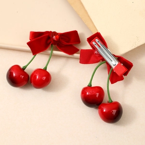 Barrette cerise en velours avec nœud en cristal rouge et détails de tige verte