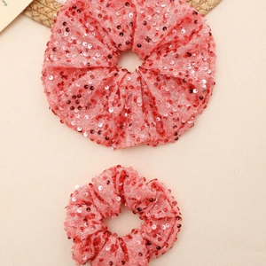 Lot de deux chouchous à paillettes rouges et roses avec texture maille brillante