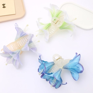 Three-piece set of elegant lily flower hair claws in white, purple, and blue colors
