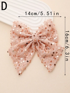 Detail view of large pink sequin bow hair clip showing measurements 14cm by 16cm