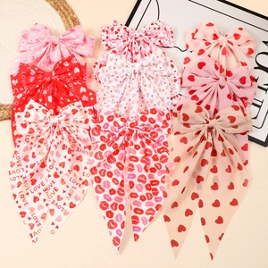 Romantic bow hair clip set with heart and lip prints for Valentine's Day hair styling