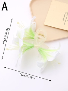 Detail view of large white lily hair claw clip with 16cm dimensions and silk petals