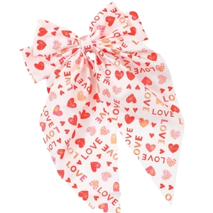 Pink bow hair clip with red hearts and LOVE print, romantic Valentine's Day hair accessory