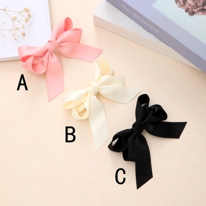 Barrettes à cheveux bohèmes avec double nœud en rose, beige et noir pour femmes