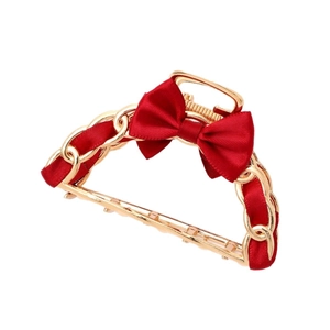 Elegant gold metal hair claw clip with red satin ribbon weave and a delicate bow tie