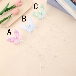 Fermagli per capelli a farfalla in rete con perle e nappine in rosa, blu e verde