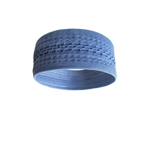 Detail of blue knitted sports headband featuring breathable diamond hollow-out patterns