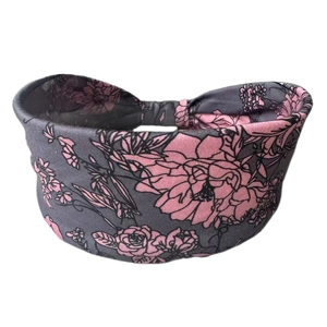 Detail of bohemian floral print on gray stretch cotton headband with roses and petals