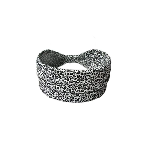 Fashionable leopard print cross knot yoga headband in black and white pattern for women