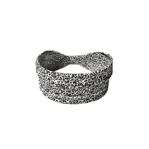 Stylish leopard print crisscross yoga headband for workout and daily facial cleansing