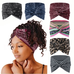 Close-up of bohemian printed headbands with paisley and leopard patterns for yoga and sports