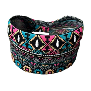 Detail of bohemian floral print on elastic sports headband with vibrant ethnic patterns