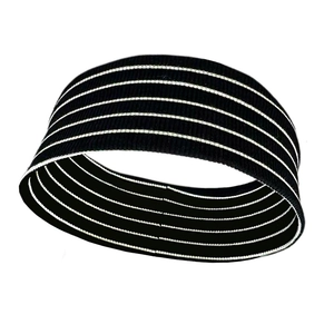 Detail showing elastic black knit headband with five white stripes and fabric texture