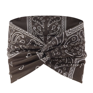 Detail of dark brown paisley print yoga headband featuring a decorative twisted cross knot