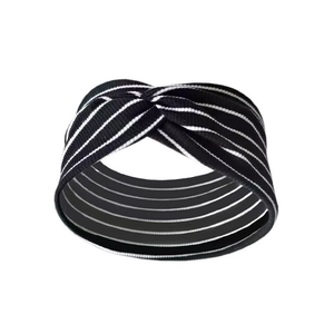 Detail of striped sports headband featuring a stylish central twist knot design
