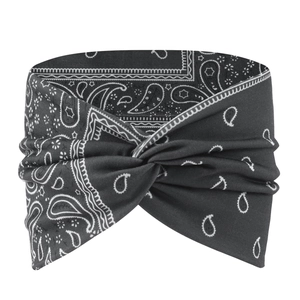 Detail shot of black bohemian headwrap featuring a classic white paisley print and twist knot