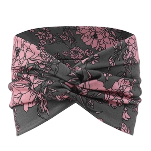 Close-up of bohemian yoga headband with dark grey floral print and twisted knot detail