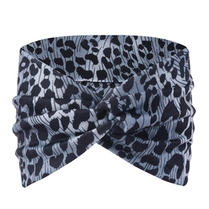 Detail view of the twisted knot and leopard print fabric on wide yoga headband