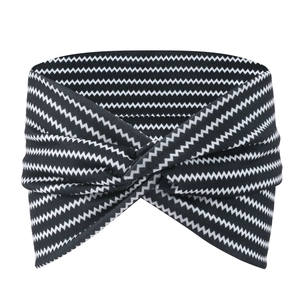 Detailed view of bohemian style headband with black and white wavy pattern and twisted front