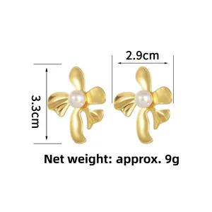 Detail view of 18K gold-plated flower earrings with white pearls and size measurements