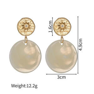 Detailed view of irregular acrylic drop earrings with metal texture and size dimensions