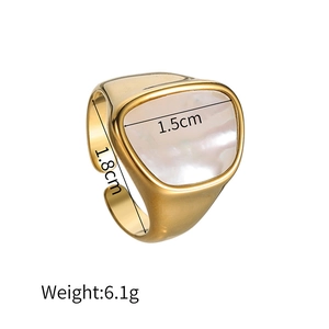 Macro view showing dimensions and 1.5cm width of the irregular gold ring with shell inlay