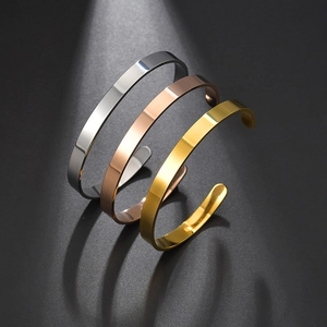 Three-piece minimalist open C-shaped stainless steel bangles in silver, gold, and rose gold