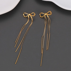 Elegant gold bow earrings with long tassel chains and metallic bar pendants