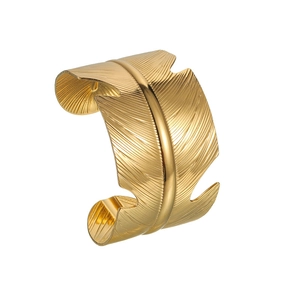 Polished gold feather cuff bracelet made of stainless steel with detailed leaf texture