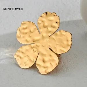 Elegant gold flower open ring with hammered texture for women in a 45-degree view
