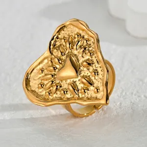 French vintage style golden heart ring with textured finish and adjustable open band