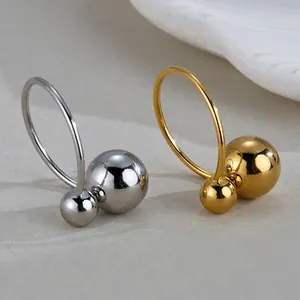 Bague minimaliste en acier inoxydable avec billes en finitions dorée et argentée