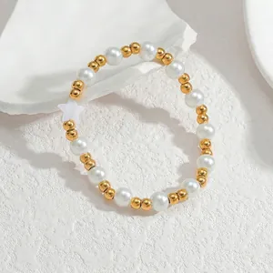 Bracciale minimalista in acciaio inossidabile con perle bianche, perle dorate e ciondolo a stella