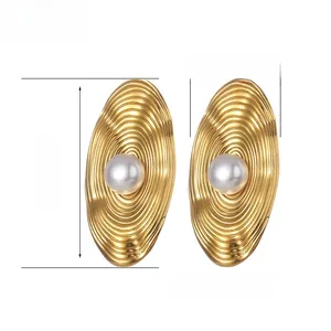 Detailed size view of oval textured earrings with pearls and 36mm height dimensions