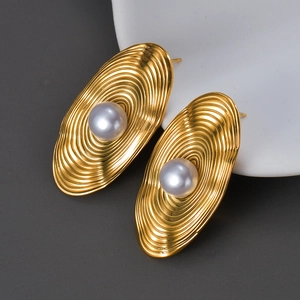Exaggerated vintage 18K gold plated oval ribbed earrings with central blue pearls